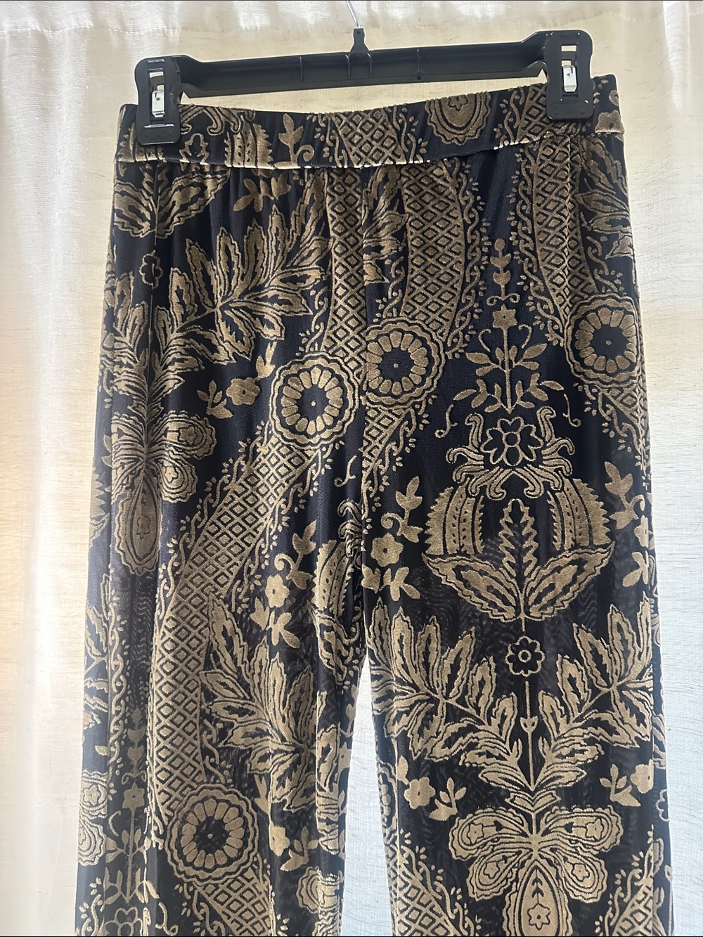 12th tribe Black and Gold Patterned Women's pants. flare at bottom